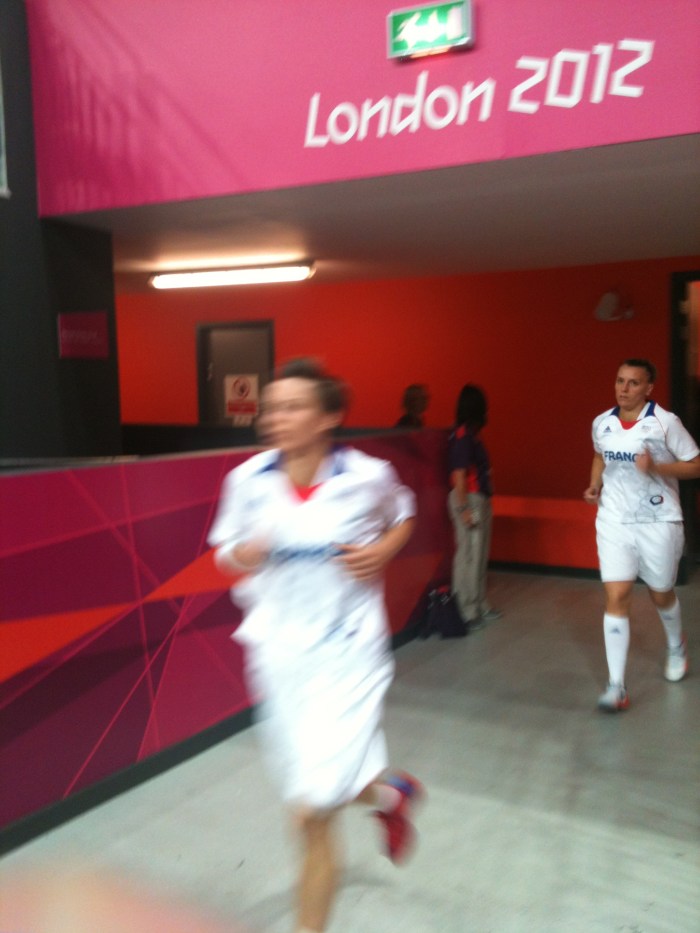 Basketbal Players Running On To Court