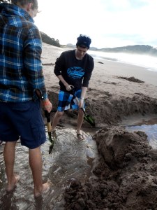 Digging the Hot Water Beach Sand