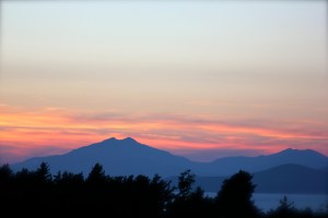 A stunning sunset behind the Greek islands across the bay