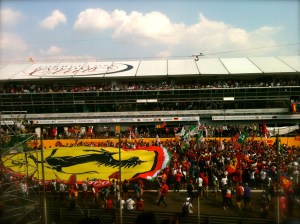 The tifosi swarm the circuit after the race